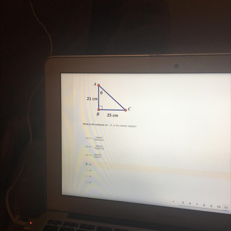 Aө21 cmB25 cmWhat is the measure of ZA, to the nearest degree?sin AoppositehypotenuseCOS-example-1