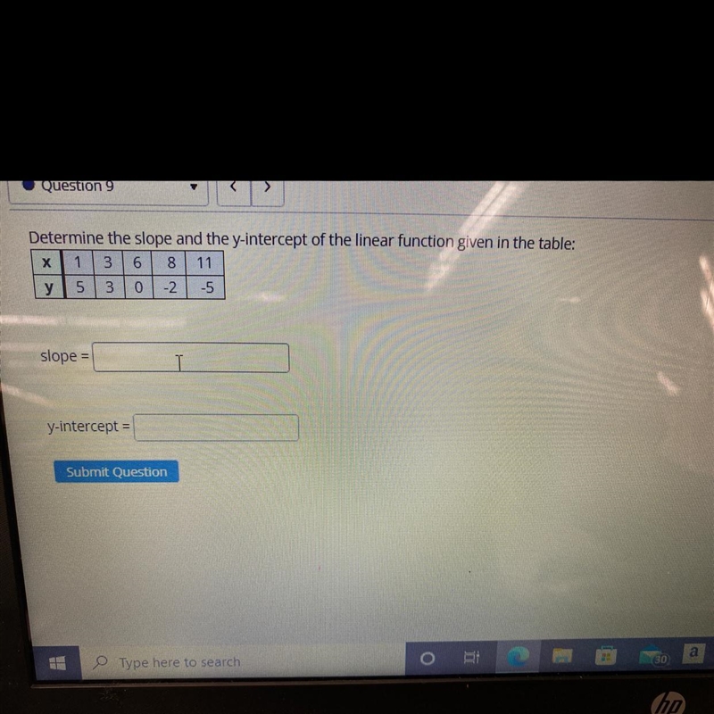 Determine the slope and y intercept from table Math HW-example-1