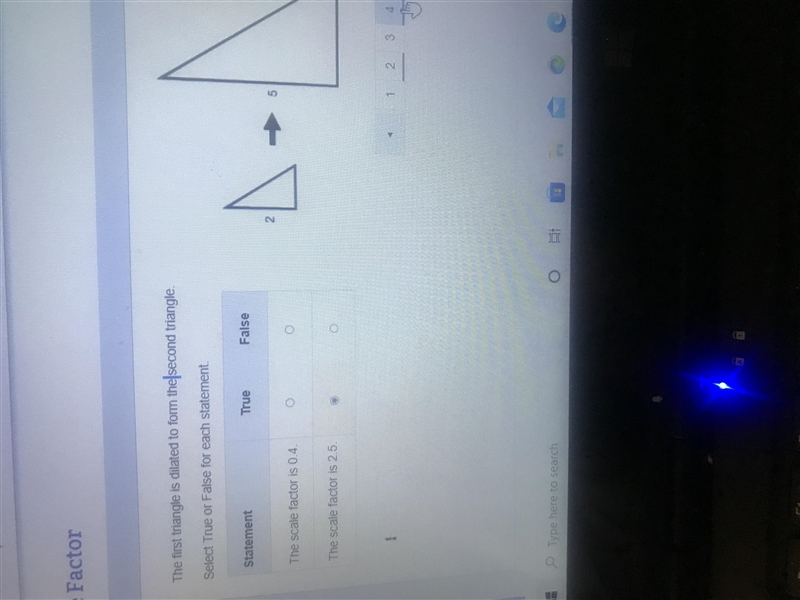 The first triangle is dilated to form the second triangle Select True or Flause-example-1