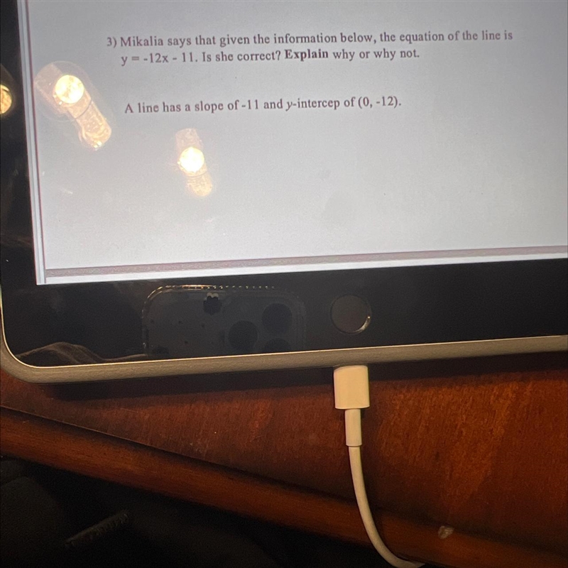 3) Mikalia says that given the information below, the equation of the line isy = -12x-example-1