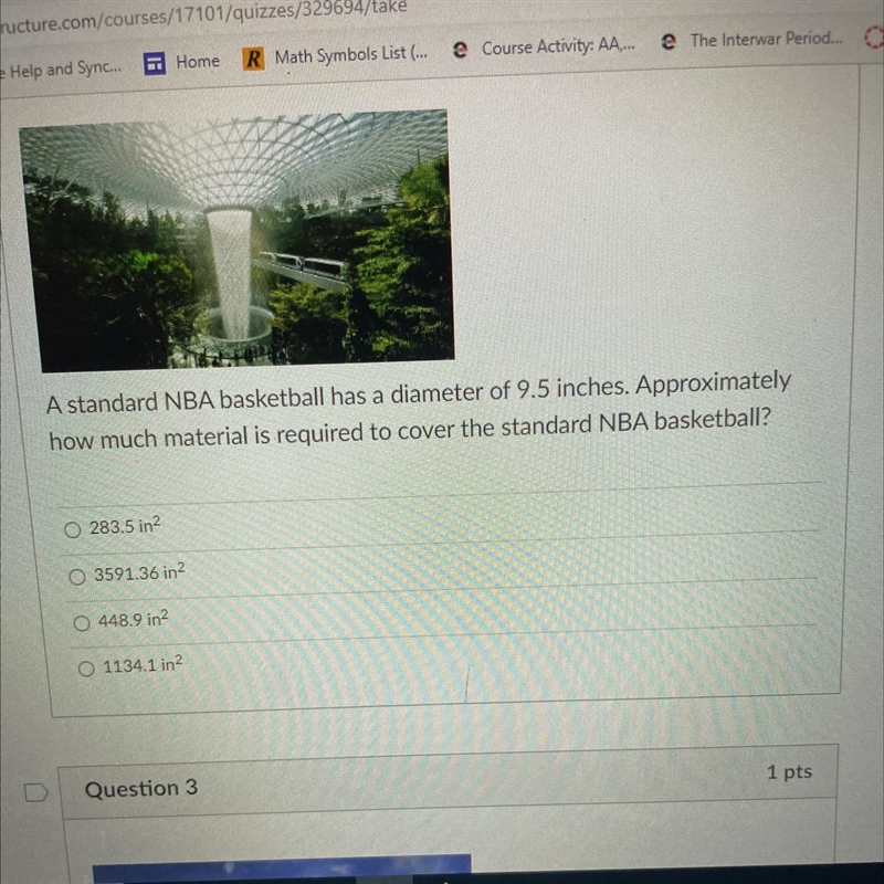 How much material is required to cover the standard NBA basketball?-example-1