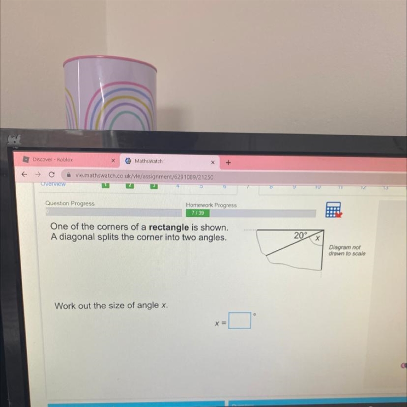 One of the corners of a rectangle is shown. A diagonal splits the corner into two-example-1