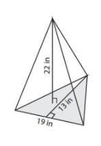 Find the volume of the triangular pyramid to the nearest whole number.-example-1