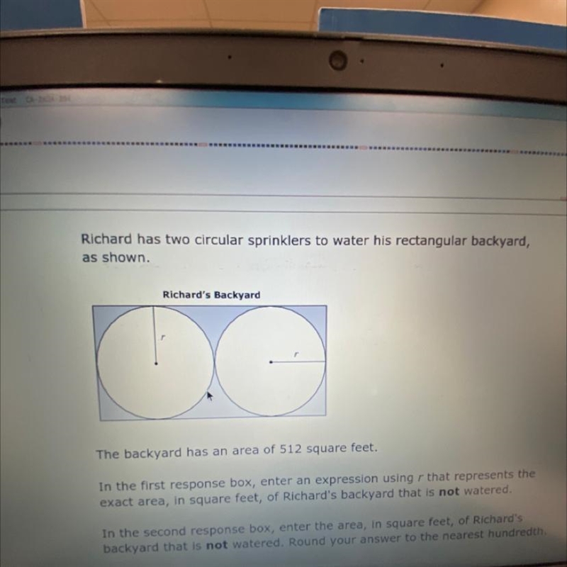 Richard has two circular sprinklers to water his rectangular backyard as shown.-example-1