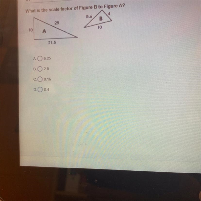 What is the scale factor of Figure B to Figure A?48.6B2510A1021.5A. O 6.25B.O 2.5C-example-1