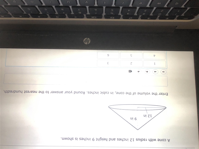 A cone with radius 12 inches and height 9 inches is shown. Enter the volume of the-example-1