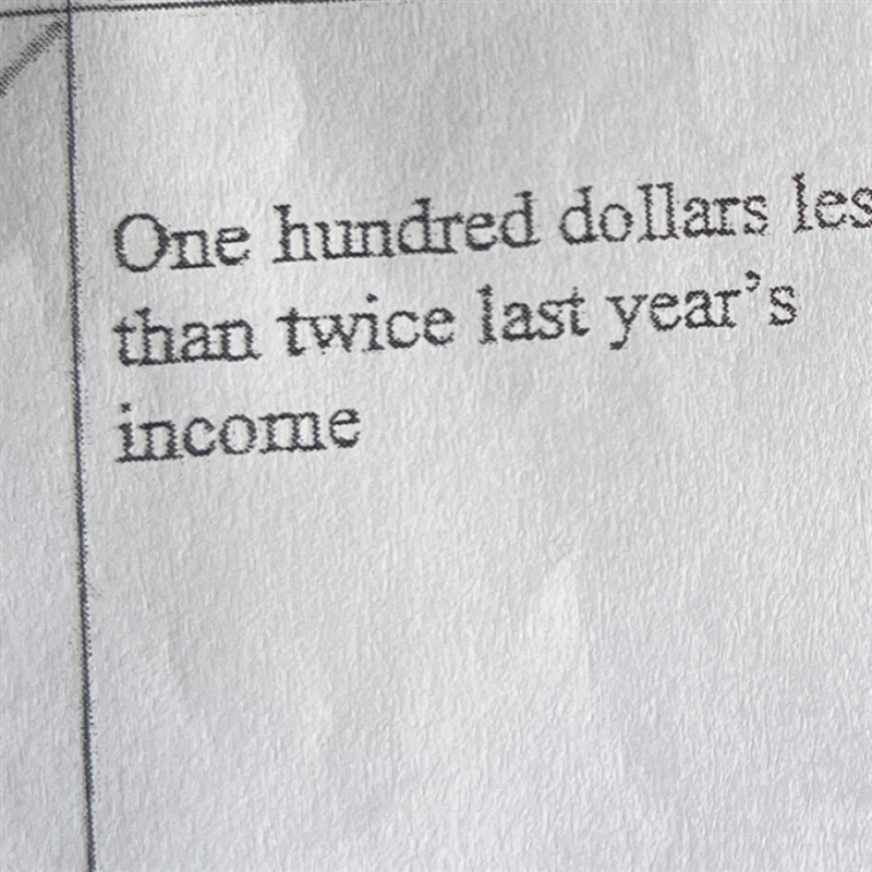 One hundred dollars less than twice last year's income?-example-1