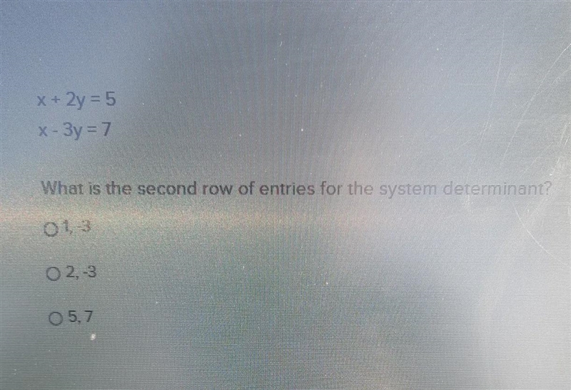 X + 2y=5x - 3y=7What is the second row of entries for the system determinant?-example-1