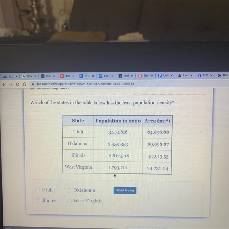 Which of the states in the table has the least population density-example-1