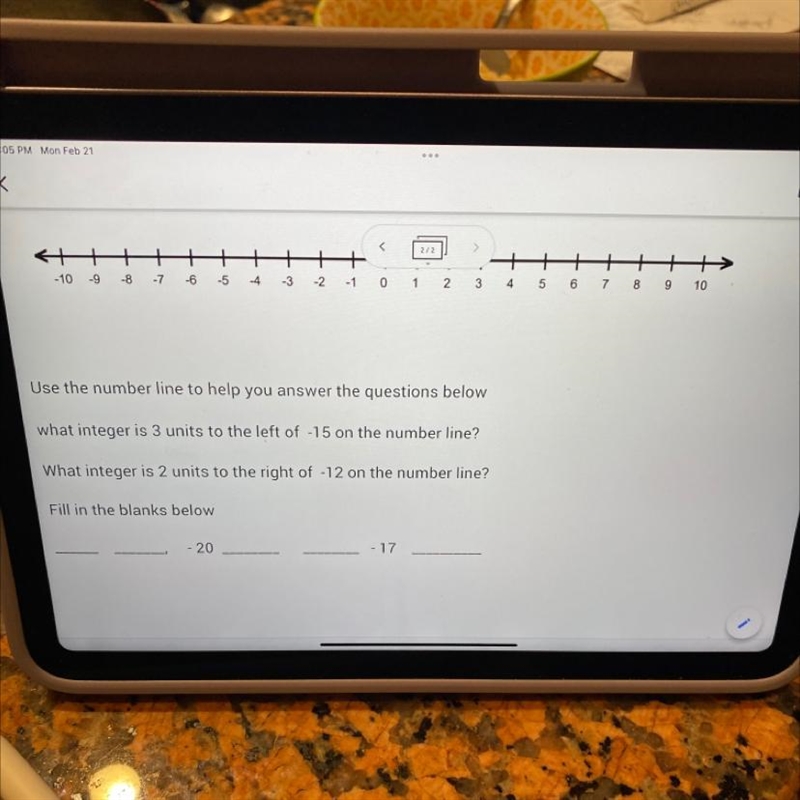 Use the number line to help you answer the questions below. What integer is 3 units-example-1