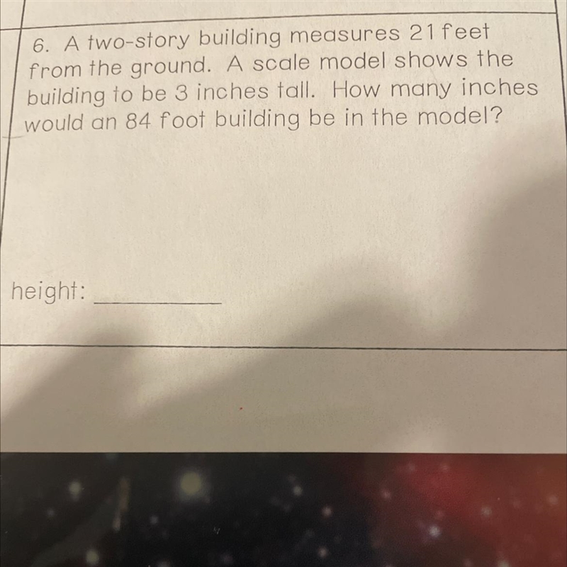 6. A two-story building measures 21 feet from the ground. A scale model shows the-example-1