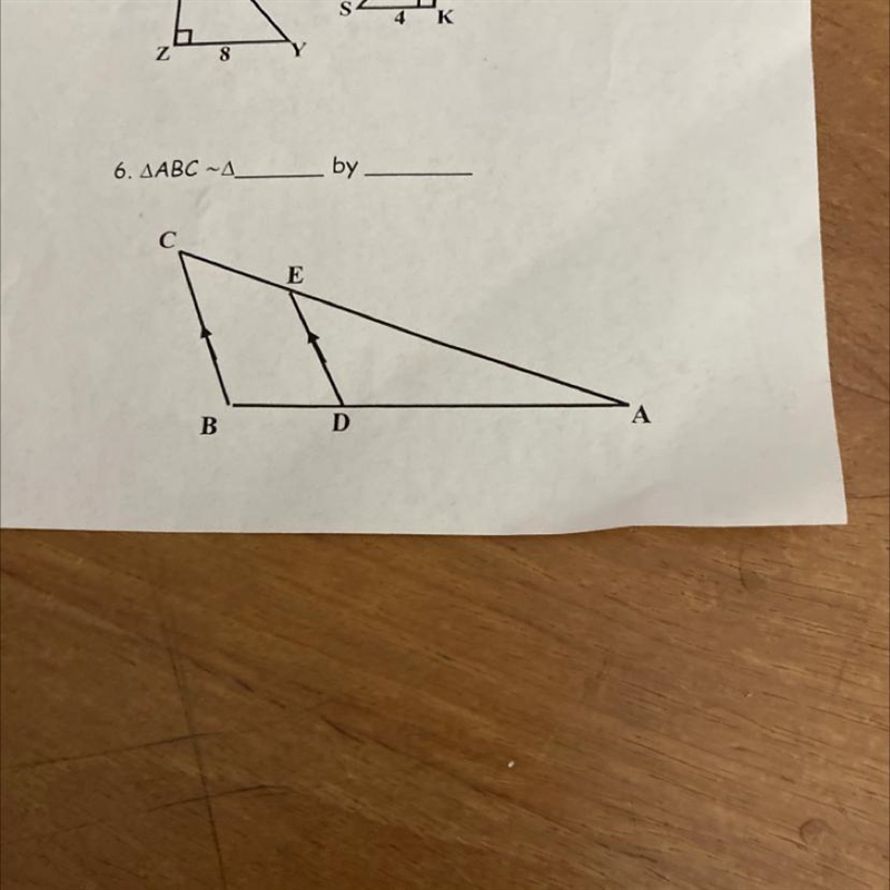 Determine whether the two triangles shown are similar. If so, state why (AA, SSS, or-example-1