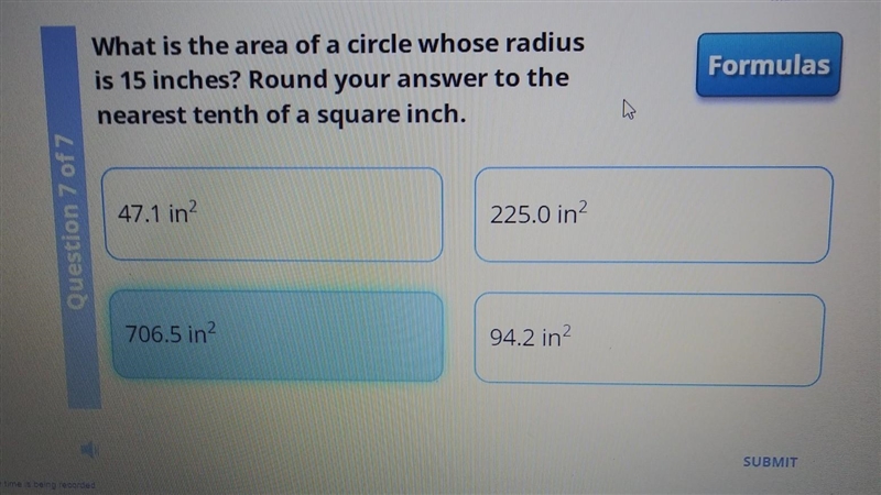 What is the area of a circle whose radius is 15 inches? Round your answer to the nearest-example-1