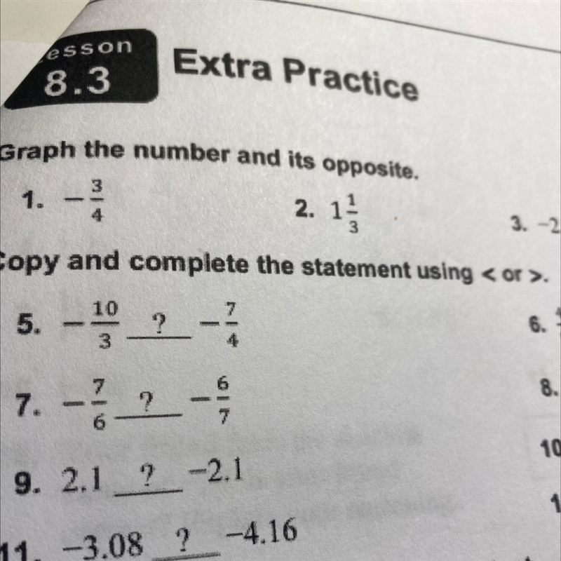 Using the greater or less than sign. -10/3 ____ -7/4-example-1