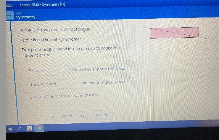 A line is drawn over this rectangle . Is the line a line of symmetry?-example-1