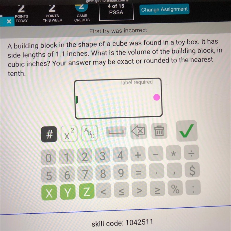 a building block in the shape of a cube was found in a toy box . it has side lengths-example-1