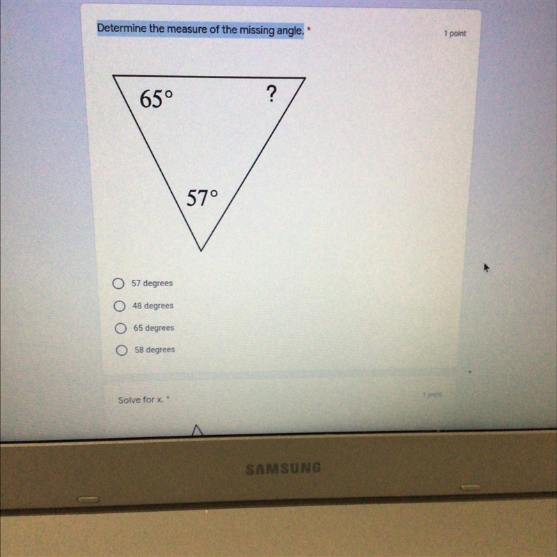 Determine the measure of the missing angle. 1 point 65° ? 57° 57 degrees O 48 degrees-example-1