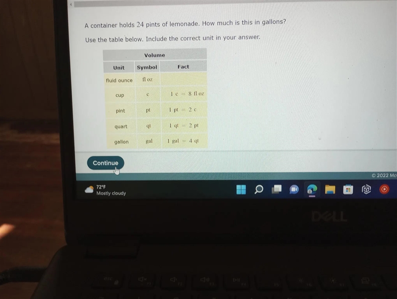 A container holds 24 pints of lemonade. How much is this in gallons? Use the table-example-1