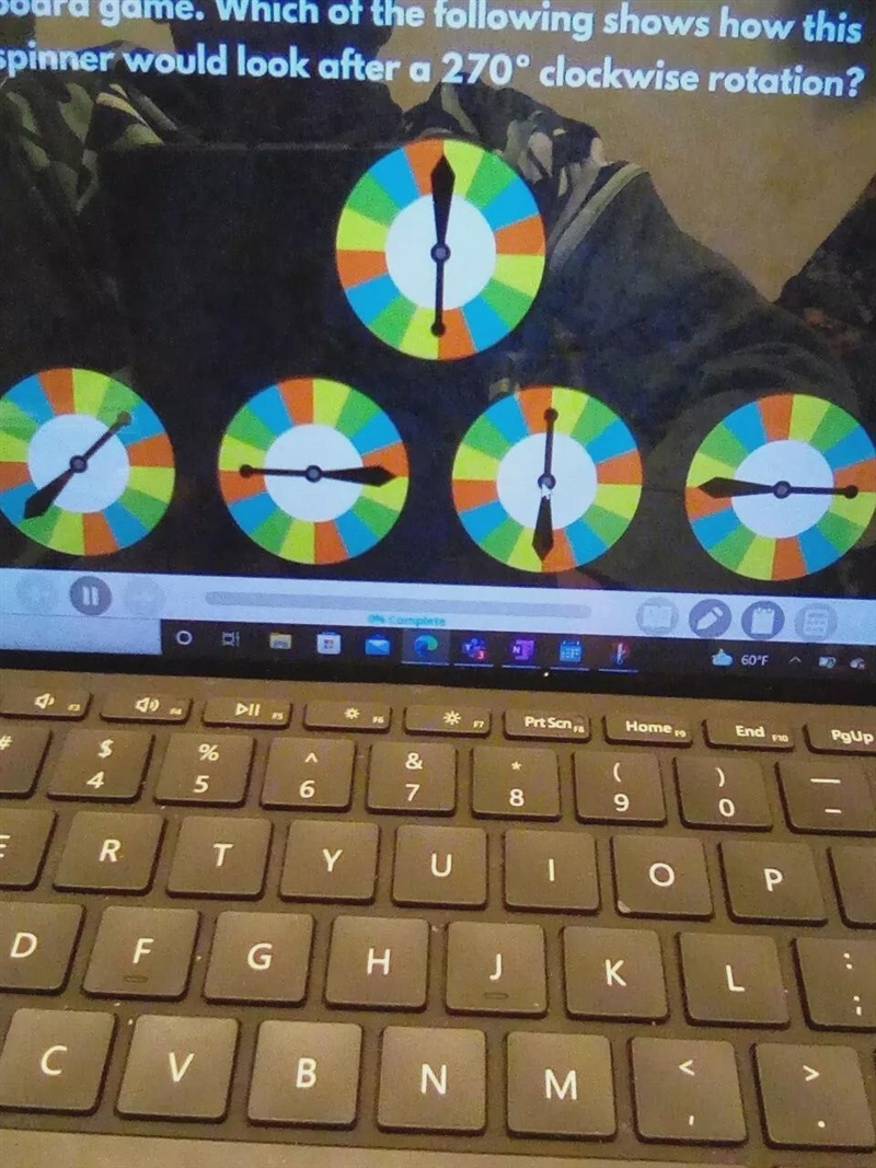 Which of the following shows how this spinner would look after a 270 clockwise rotation-example-1