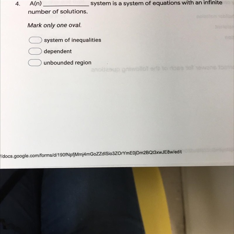 An _____ system is a system of equation with an infinite number of solutions.-example-1