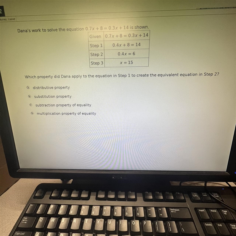 Funez, Lianet Dana's work to solve the equation 0.7x + 8 = 0.3x + 14 is shown. Given-example-1