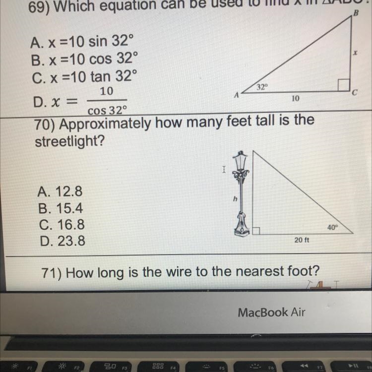 70) Approximately how many feet tall is thestreetlight?A. 12.8B. 15.4C. 16.8D. 23.8-example-1