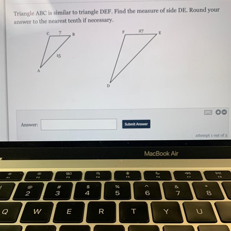 Triangle ABC is similar to triangle DEF. Find the measure of side DE. Round youranswer-example-1