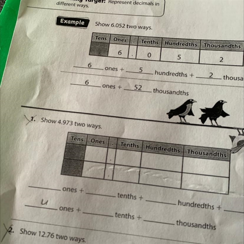 How do you show4.973 in two ways-example-1