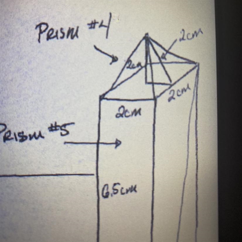 What’s the volume and surface area of the object shown ? Prism 4-example-1