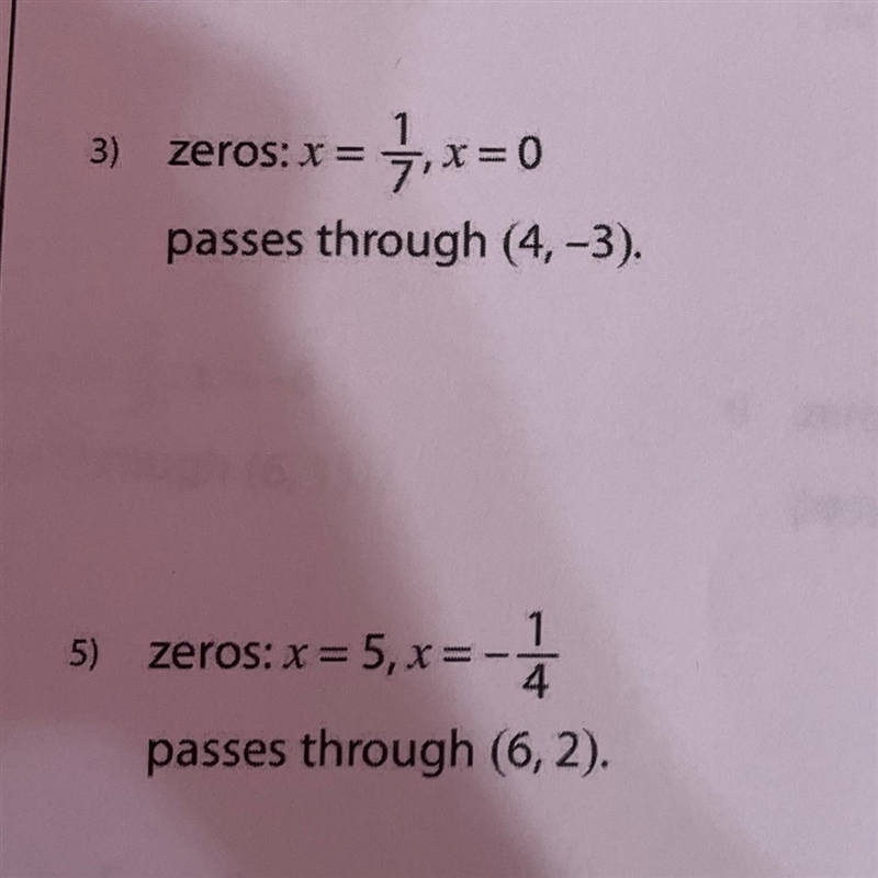 Find a quadratic function with the given zeros and passing through the given point-example-1