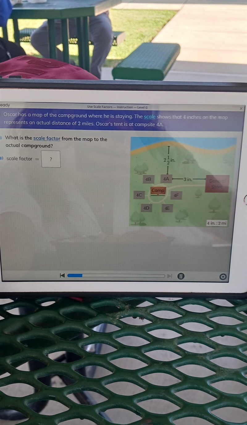 Oscar has a map of the campground where he is staying. The scale shows that 4 inches-example-1