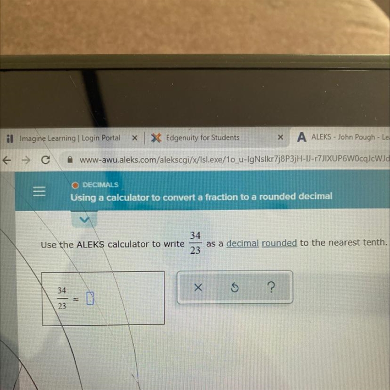 Use the ALEKS calculator to write as a decimal rounded to the nearest tenth.-example-1