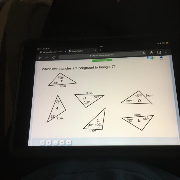 Which two triangles are congruent to triangle T?-example-1