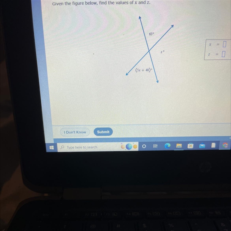 Given the figure below, find the values of x and z. 63° (5x + 48)°-example-1