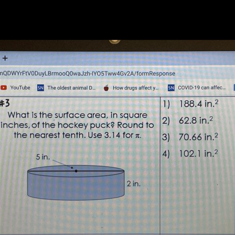 What is the surface area, in squareinches, of the hockey puck? Round tothe nearest-example-1