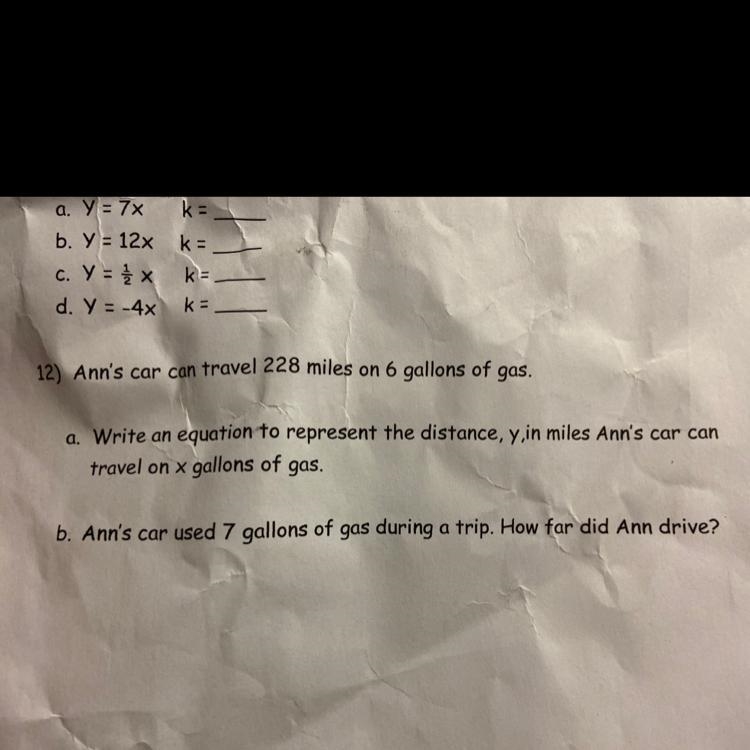 12) Ann’s car can travel 228 miles on 6 gallons of gas.A)Write an equation to represent-example-1