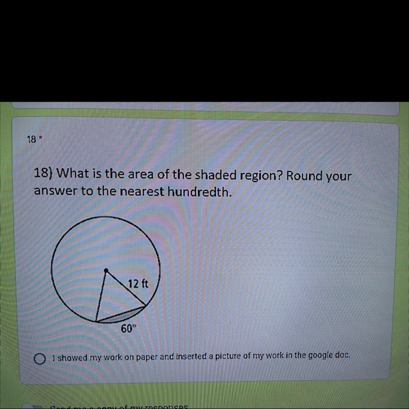 18) What is the area of the shaded region? Round youranswer to the nearest hundredth-example-1