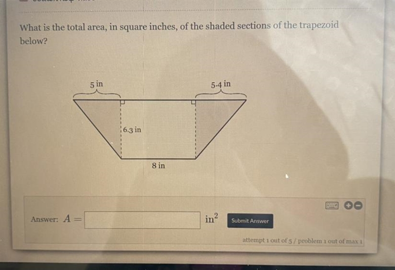 What is the total area, in square inches, of the shaded sections of the trapezoid-example-1