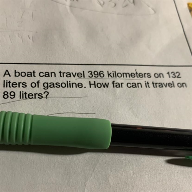 A boat can travel 396 km On 132 L of gasoline how far can it travel on 89 L-example-1