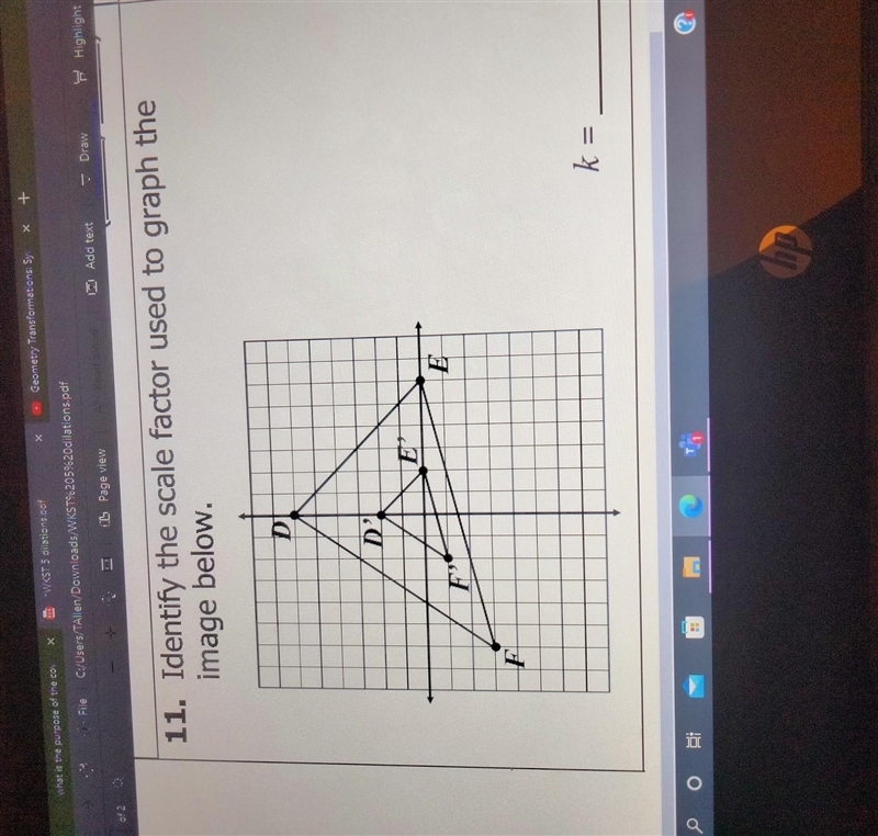 11. Identify the scale factor used to graph the image below. ​-example-1