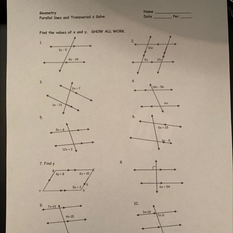 Geometry parallel lines and transversal solve. Find the values of x and y.-example-1