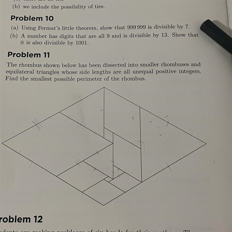 The rhombus shown below has been dissected into smaller rhombuses and equilateral-example-1