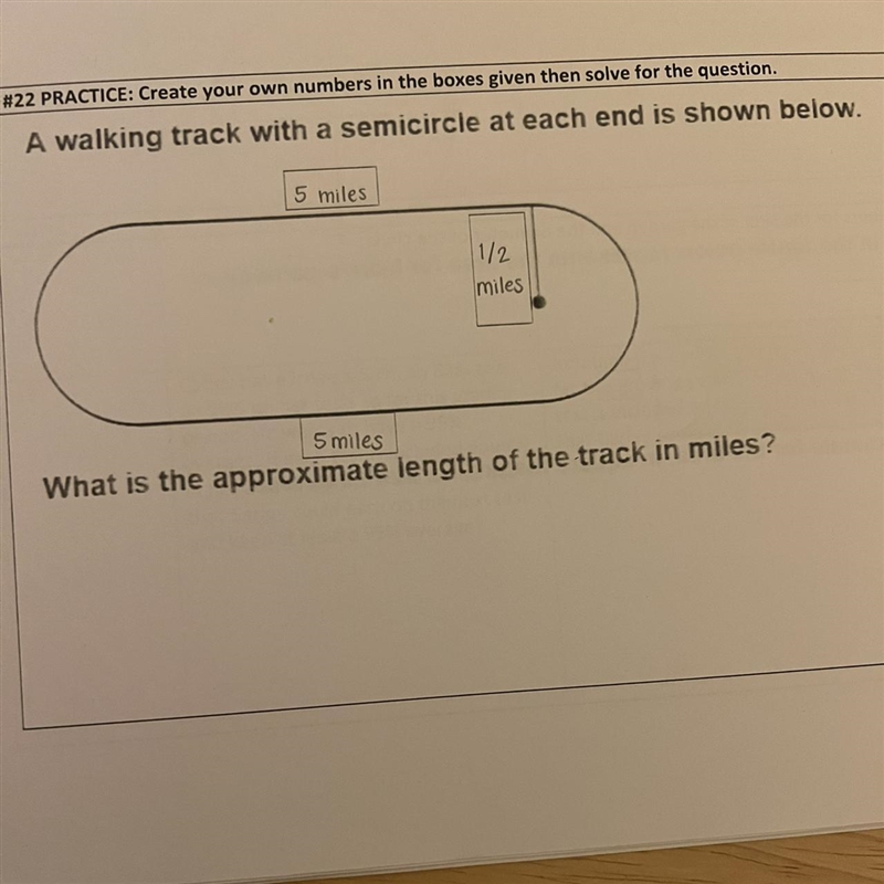 What is the approximate length of the track in miles-example-1