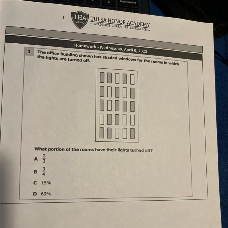 The office building shown has shaded windows for the rooms in which the lights are-example-1