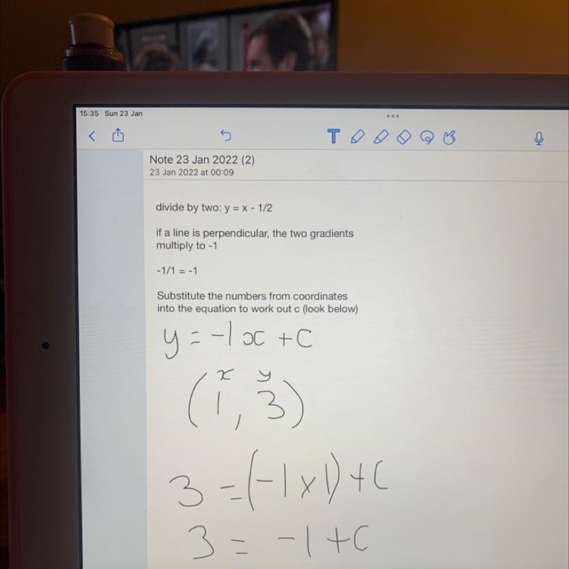 Find the equation of the line that passes through (1,3) and is perpendicular to 2 y-example-1