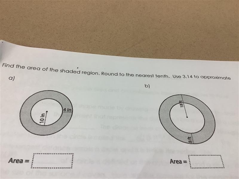 Find the area of the shaded region.-example-1