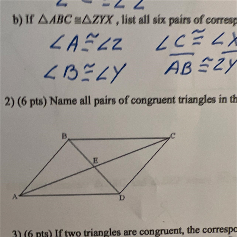 Name all pairs of congruent triangles in the parallelogram shown below.-example-1