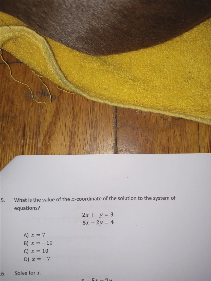 What is the value of the x-coordinate of the solution to the system of equations? 2x-example-1