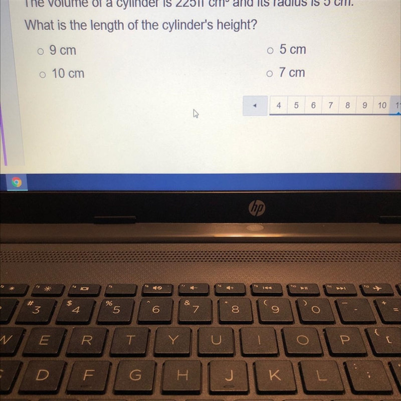 The volume of a cylinder is 225pi cmand its radius is 5 cm.What is the length of the-example-1