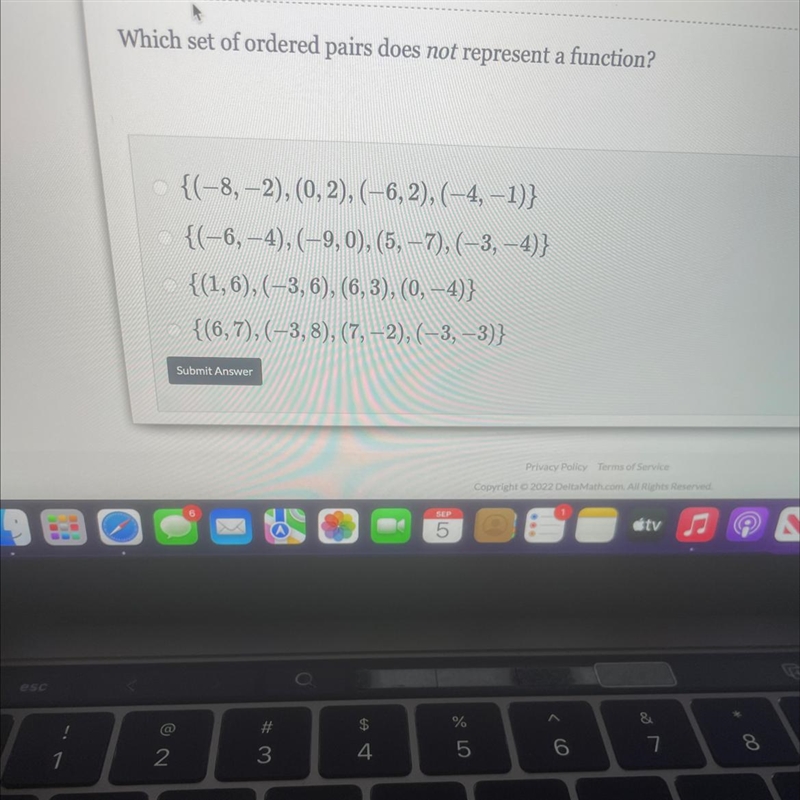 Which set of ordered pairs does not represent a function? {(-8,-2), (0, 2), (-6, 2), (-4,-1)} {(-6,-4), (-9, 0), (5, -7), (-3,-4)} ○ {(1,6), (-3, 6), (6, 3), (0, -4)} {(6, 7), (-3, 8), (7,-2), (-3,-3)}-example-1